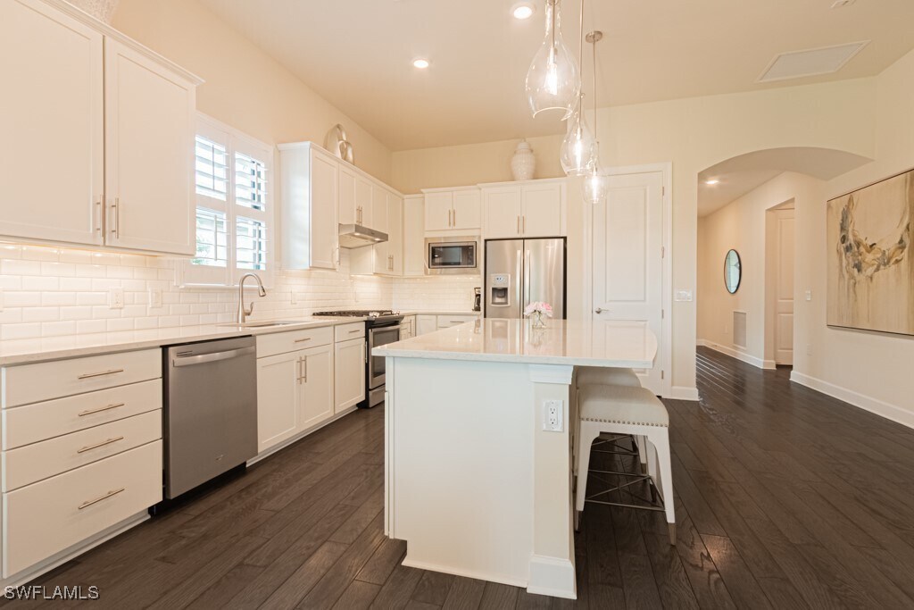 19100 Marquesa Dr in Miromar Lakes, FL - Building Photo