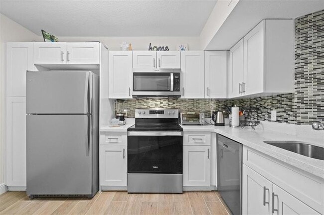 8851 Wiles Rd in Coral Springs, FL - Building Photo - Building Photo