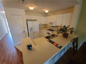 4455 Botanical Pl Cir-Unit -202 in Naples, FL - Building Photo - Building Photo