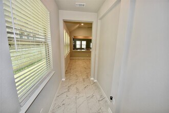 22491 Kinley St in New Caney, TX - Building Photo - Building Photo