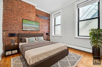 Stanton Street, Unit 6G in New York, NY - Building Photo - Building Photo