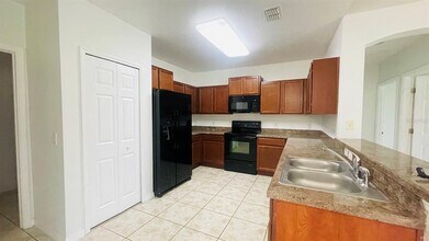 4044 Marina Isle Dr in Kissimmee, FL - Building Photo - Building Photo