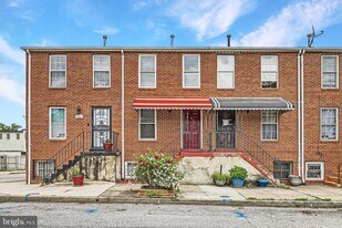 243 N Gilmor St in Baltimore, MD - Building Photo