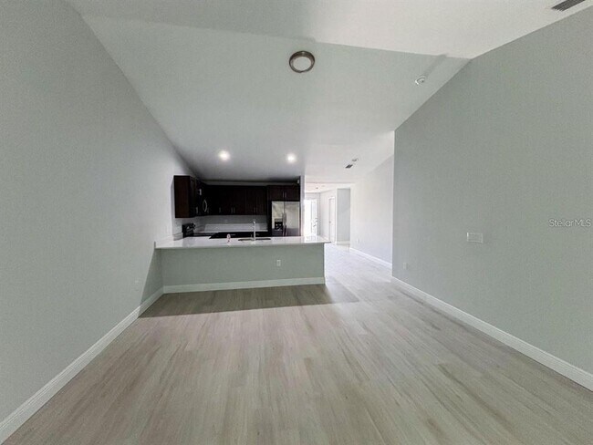 8511 Dinnano St in Port Charlotte, FL - Building Photo - Building Photo