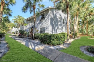 1965 Courtyard Way, Unit 106 in Naples, FL - Building Photo