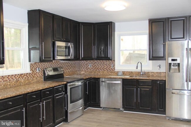 property at 10616 Moores Ln