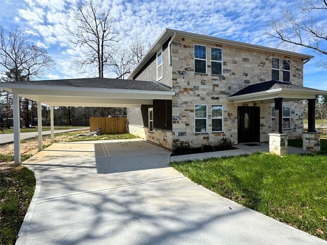 10594 Rustling Oaks Dr in Conroe, TX - Building Photo - Building Photo