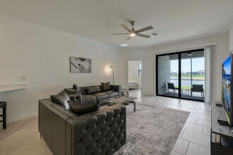 19501 Hinkley Dr in Estero, FL - Building Photo - Building Photo