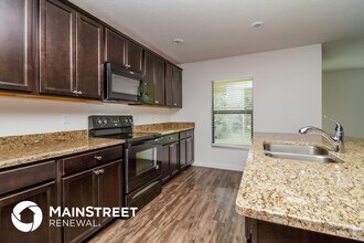 1864 Piedmont Ct in Mascotte, FL - Foto de edificio - Building Photo