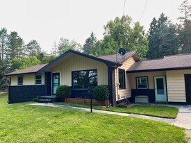 14834 Hawkins Rd in Hubbard Lake, MI - Building Photo