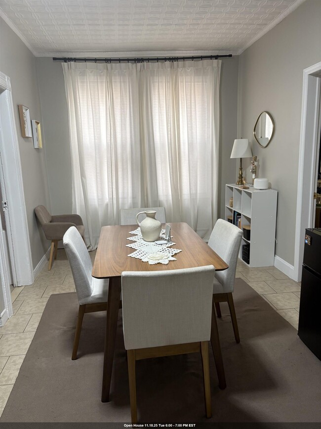 property at 121-123-123 W 25th St