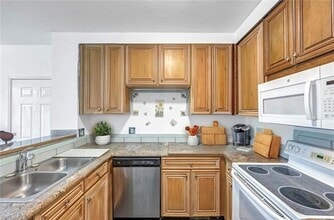1220 Reserve Way, Unit 107 in Naples, FL - Building Photo - Building Photo