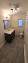 61 E Main St, Unit 7 in Kings Park, NY - Building Photo - Building Photo