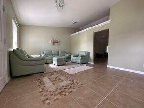 707 NW Floresta Dr in Port St. Lucie, FL - Building Photo - Building Photo