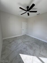 2401 Millie Ave S in Lehigh Acres, FL - Building Photo - Building Photo
