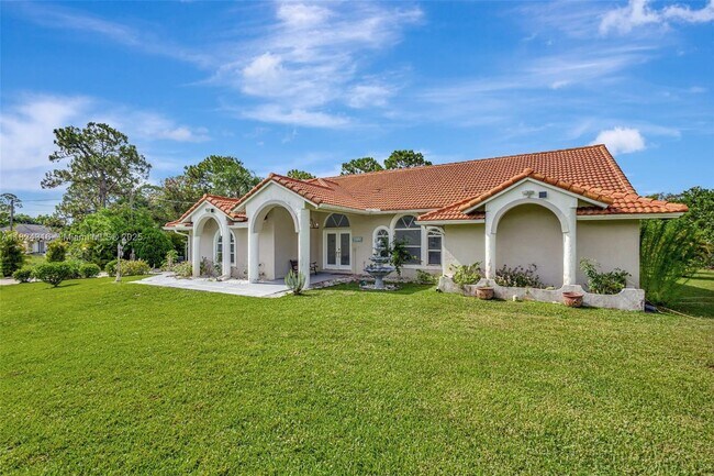 17084 33rd Rd N in The Acreage, FL - Building Photo - Building Photo