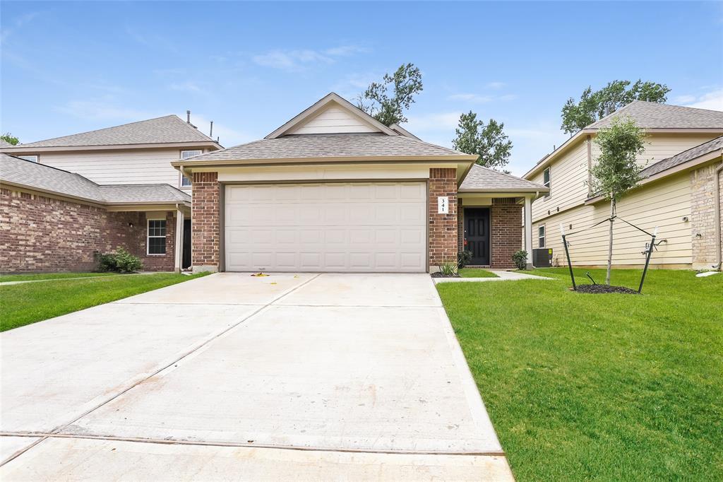 341 Shelby Meadow Dr in Willis, TX - Building Photo