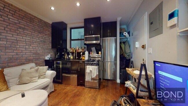 property at 422 E 9th St