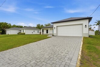 12542 Mohican Ave in Port Charlotte, FL - Building Photo - Building Photo
