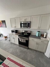 1406 Deepwater Cir in Eagle Lake, FL - Building Photo - Building Photo