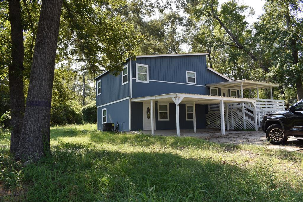 15 Walnut Ln in Pointblank, TX - Building Photo