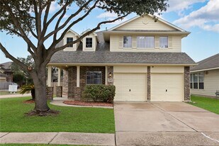 7447 Oakwood Canyon Dr in Cypress, TX - Building Photo