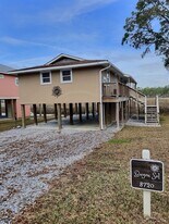 8720 W Simmons Bayou Dr in Ocean Springs, MS - Building Photo