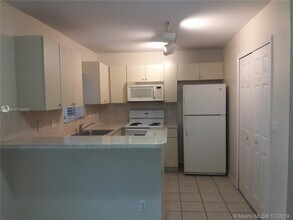 1261 SE 29th St-Unit -106-25 in Homestead, FL - Building Photo - Building Photo