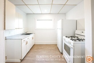 Cat-Friendly Downtown Taber Apartment with Laundry Access in Taber, AB - Building Photo - Building Photo