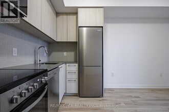 7437 Kingston Rd in Toronto, ON - Building Photo - Building Photo