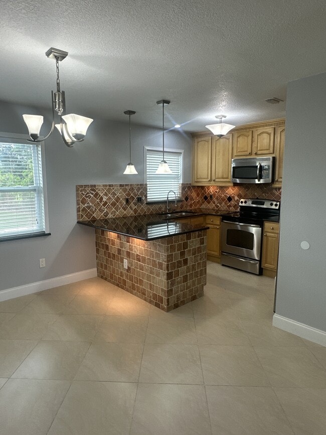 property at 7210 N Manhattan Ave