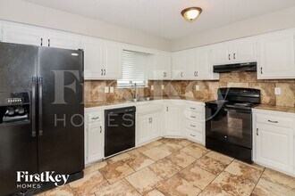 14411 Craig Ave, Unit X - 13 in Grandview, MO - Building Photo - Building Photo