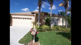 1242 Olympic Cir in Greenacres, FL - Building Photo