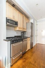 E 13TH ST., Unit 4E in New York, NY - Building Photo - Building Photo