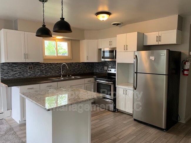 property at 1201-11 1/2 11 1/2 St N