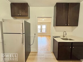 3302 W Schubert Ave, Unit 1E in Chicago, IL - Building Photo - Building Photo