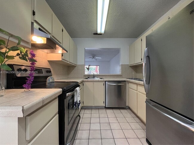 property at 407 Palm Cir E