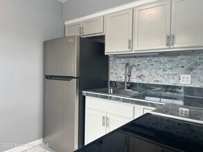 402 Adams Ave in Cape Canaveral, FL - Building Photo - Building Photo