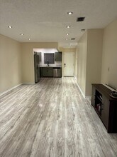 6001 Shaker Wood Cir in Tamarac, FL - Building Photo - Building Photo