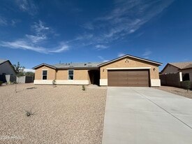 8481 W Reventon Dr in Arizona City, AZ - Building Photo