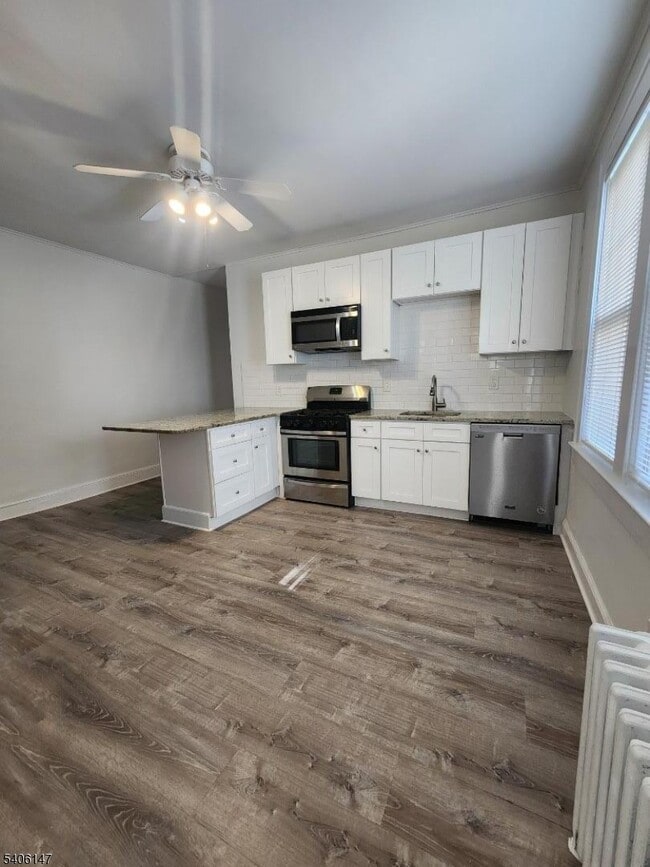 property at 9 Lois Pl