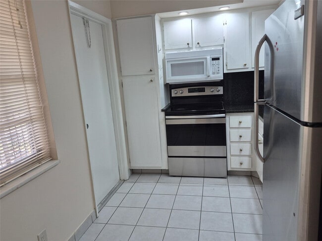 property at 3100 N Palm Aire Dr