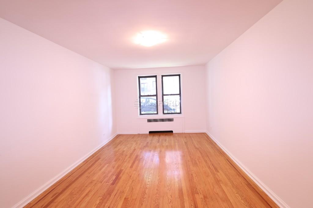 98-11 Queens Blvd-Unit -2C in Rego Park, NY - Building Photo