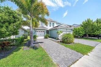 15406 Goldfinch Cir in Westlake, FL - Building Photo - Building Photo