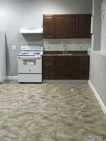 94 4th Ave-Unit -107 in Bay Shore, NY - Building Photo - Building Photo
