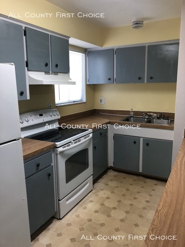 1113 Ohio Ave-Unit -103 in Dunedin, FL - Building Photo - Building Photo