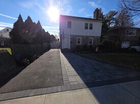 11 Lawrence Ave in Malverne, NY - Building Photo
