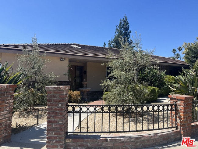property at 13104 Magnolia Blvd