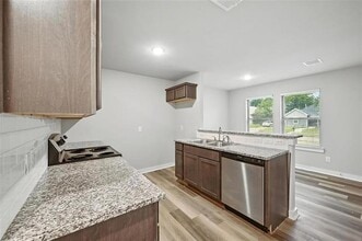 324 W Munson St in Denison, TX - Foto de edificio - Building Photo