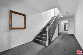 129 N Swall Dr in Los Angeles, CA - Building Photo - Building Photo